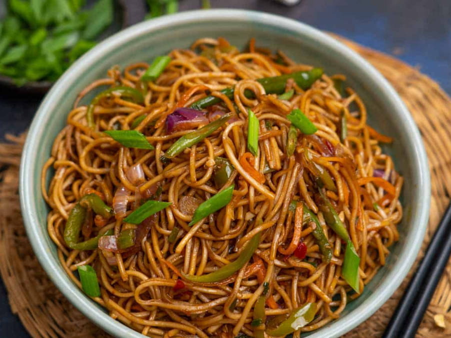 Thursday - Chilli Garlic Veg Noodles with Manchurian Dumplings, Grilled Veg Tikka Sandwich, and Ketchup