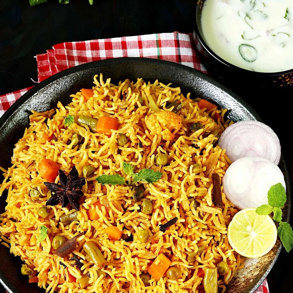 Friday Lunch - Paneer Biryani with Raita and Fruits