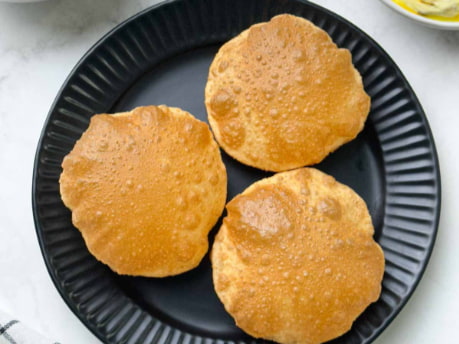 Friday Breakfast - Poori with Aloo Palya and Fruits