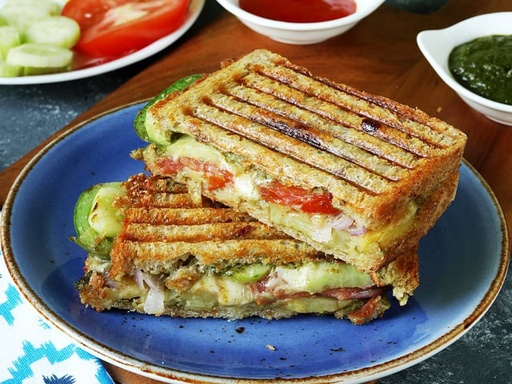 Wednesday Breakfast - Mix Veg Grilled Club Sandwich with Onion Rings, Fruits, and Ketchup